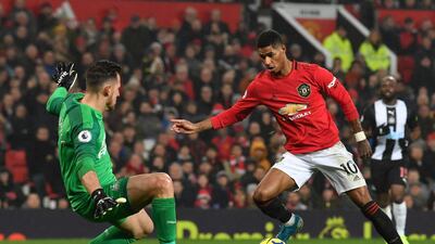 Manchester United's Marcus Rashford vies for the ball with Newcastle United's Martin Dubravka. AFP