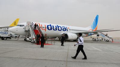 Guests walk past the flydubai B737-700 BBJ plane at the show in 2013. Sarah Dea / The National
