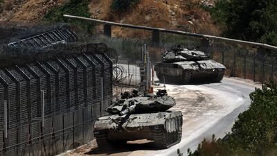 Israeli soldiers patrol the ceasefire line near the occupied Golan Heights village of Majdal Shams. After the fall of Syria's Bashar Al Assad last year, the Israeli army entered the demilitarised buffer zone. EPA