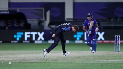 Namibia's Michael Van Lingen watches the ball run down the field. AP