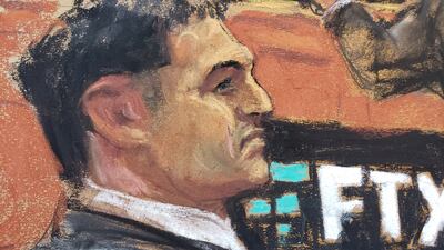 FTX founder Sam Bankman-Fried watches as his lawyer makes opening remarks in his fraud trial in a New York City courtroom. Reuters