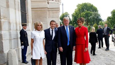 French President Emmanuel Macron, second left, his wife Brigitte, left, pose with U.S President Donald Trump and First Lady Melania Trump at Les Invalides museum in Paris Thursday, July 13, 2017. President Donald Trump and French President Emmanuel Macron planned to meet Thursday in Paris to focus on issue where they can take U.S.-French relations forward, security and defense issues chief among them. (AP Photo/Michel Euler)