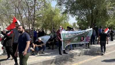 PMF fighters and supporters are preparing for the funeral procession near Baghdad’s fortified Green Zone for four fighters killed in Monday’s US air strikes along Iraq-Syria border. Sinan S. Mahmoud / The National