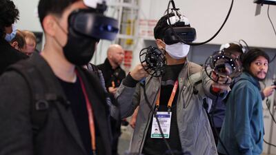 People play virtual reality video games during the Consumer Electronics Show in Las Vegas, earlier this month. AFP