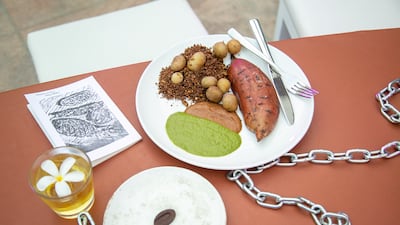 Caique Tizzi's cacao menu. Chains, like those used to enslave people, snake their way along the tables. Photo: Abu Dhabi Art