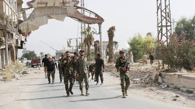 The surrender of Daraya, which became an early symbol of the nascent uprising against Syrian president Bashar Al Assad, marks a success for his government, removing a persistent threat only a few miles from his seat of power. AP Photo