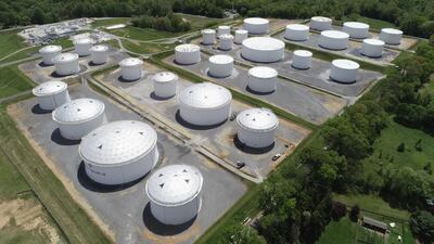 Holding tanks are seen in an aerial photograph at Colonial Pipeline's Dorsey Junction Station in Woodbine, Maryland. A ransomware attack on the 2.5 million barrels per day Colonial Pipeline has endangered access to fuel for the US East Coast. Reuters