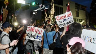 Protesters outside the Japan National Stadium before the closing ceremony of the Tokyo Olympic Games.