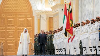 Sheikh Mohamed bin Zayed, Crown Prince of Abu Dhabi and Deputy Supreme Commander of the UAE Armed Forces, and Egypt's President Abdel Fattah El Sisi inspect the Presidential Guard at Qasr Al Watan on Thursday. Courtesy Sheikh Mohamed bin Zayed Twitter