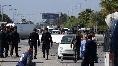 Police and forensic experts get to work. AFP