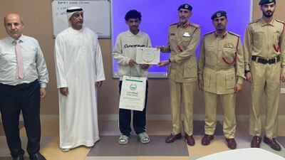 Al Qusais Police honoured a Dubai pupil for returning a wallet containing Dh200,000. Photo: Dubai Police