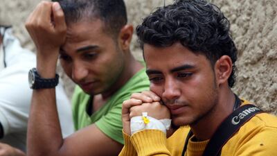 Journalists sit during the funeral of fellow journalists Wael Al Absi and Taqiaddin Al Hudhaifi who were killed by a shell as they were covering fighting between Houthi fighters and pro-government fighters in Taiz, Yemen on May 26, 2017. Anees Mahyoub / Reuters