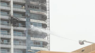 The fire is put out at Zen Tower. Leslie Pableo for The National