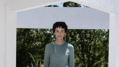 A simple wrap dress in a shifting grey tone, for the Qasimi spring / summer 2022 collection. Courtesy Qasimi