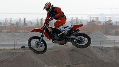 The British motocross rider Sam Sunderland, who was offered a sponsorship deal by the bike manufacturer KTM while visiting relatives in the UAE, rides the circuit at the Motorcross Park in Jebel Ali.