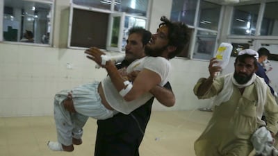 An Afghan man who was injured when militants attacked central prison, is shifted to a hospital in Jalalabad, Afghanistan. EPA