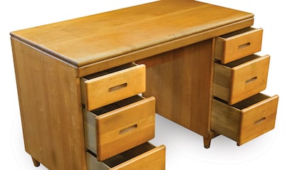 A desk that was once used by Steve Jobs is one of many items being auctioned by his stepbrother. RR Auction
