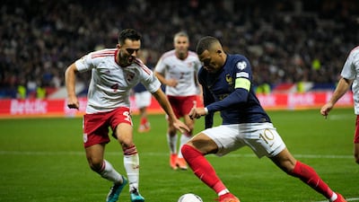 France's Kylian Mbappe, centre, in action. AP