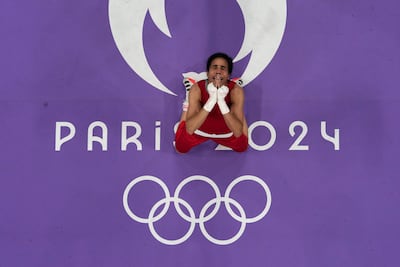 Morocco's Widad Bertal celebrates after her verdict over Thailand's Jutamas Jitpong. AP
