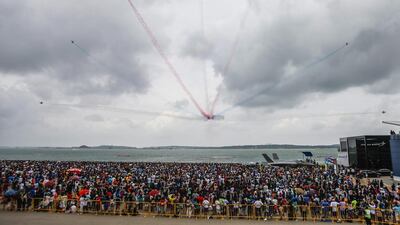 T-50 fighter jets, flown by the South Korean Black Eagles aerial acrobatic team, perform a manoeuvre over the crowd during the Singapore Airshow, in Singapore. Wallace Woon / EPA
