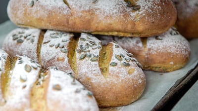 Freshly baked whole wheat organic bread with pumpkin seeds from the organic kitchen.