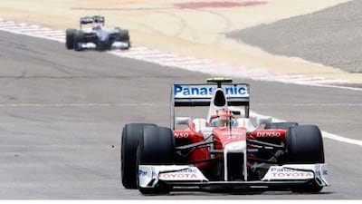 Toyota Formula One driver Timo Glock of Germany drives into pit lane during practice for the Bahrain F1 Grand Prix in Manama on April 24, 2009.