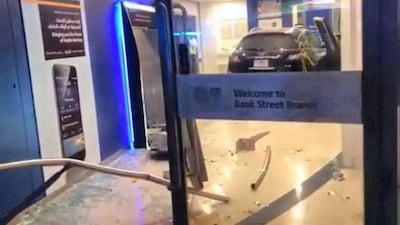 Two people were injured on Thursday night after a driver lost control of his vehicle and crashed into an ATM booth at Burjuman shopping centre, Dubai Police said.