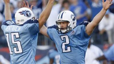 Rob Bironas, right, celebrates after he slots over his 47-yard field goal in overtime against the Green Bay Packers.