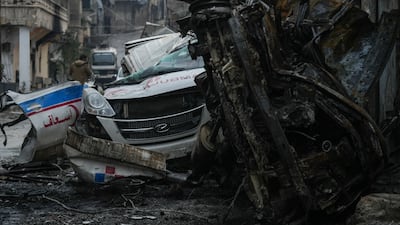 Damaged cars following clashes. Aleppo's governor said the security situation in the area was returning to normal in the neighbourhood of Sheikh Maqsoud. EPA