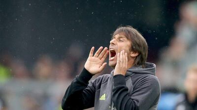 Antonio Conte shouts orders at his players during the match. Lisi Niesner / EPA