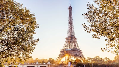 Travellers are visiting destinations as seen on screen, such as the French capital thanks to Emily in Paris. Getty Images