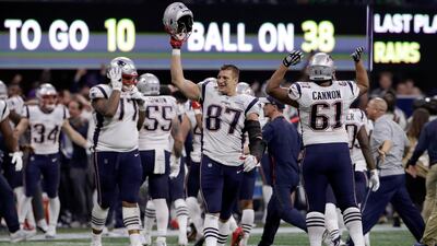 The Patriots' Rob Gronkowski (87) celebrates with teammates after Super Bowl LIII had been won. Reuters
