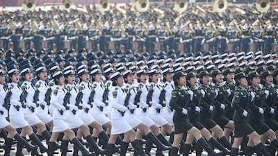 Soldiers of People's Liberation Army march in formation during the military parade marking the 70th founding anniversary of People's Republic of China in Beijing. AFP