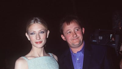 Cate Blanchett, in a beaded midi, and her husband, Andrew Upton, at the AFI Film Awards in Sydney, Australia, on November 13, 1999. Getty Images