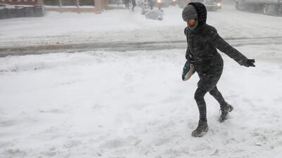 People struggle against wind and snow in Brooklyn, New York City. Brendan McDermid / Reuters