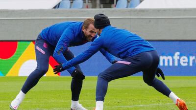 England's Harry Kane, left, with Kyle Walker during a training session in Iceland on Monday, September 7. Reuters