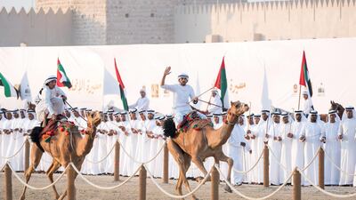 Camel riders participate in the Union March during the Sheikh Zayed Heritage Festival. Rashed Al Mansoori / Crown Prince Court - Abu Dhabi