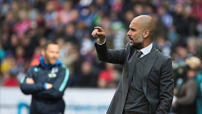 Bayern Munich manager Pep Guardiola is aware of the challenge his side face against Atletico Madrid. Odd Andersen / AFP
