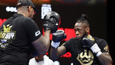 Deontay Wilder trains with his head coach Malik Scott. Getty