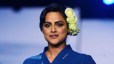 Indian Bollywood actress Neha Mahajan showcases a creation by designer Jayati Goenka during Lakme Fashion Week in Mumbai on February 13, 2020. AFP