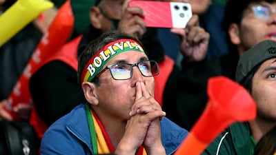 A Bolivia fan watches on. Reuters