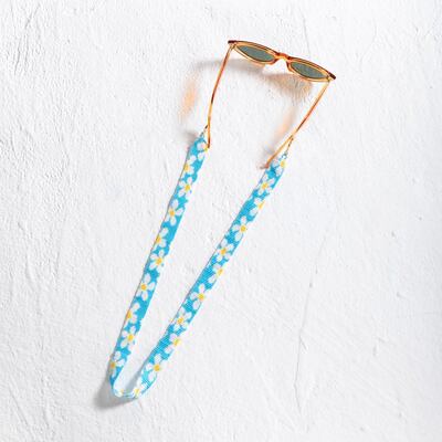 Soraya Hennessy designs straps for sunglasses with beaded floral detailing