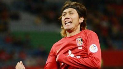 Japan's Urawa Red Diamonds midfielder Yosuke Kashiwagi celeberates his opening goal against Thailand's Muangthong United.
