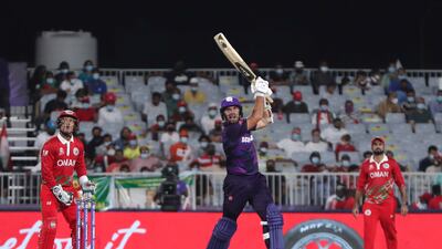 Scotland's captain Kyle Coetzer, right, during the T20 World Cup first round match against Oman in Muscat on Thursday, October 21, 2021. AP
