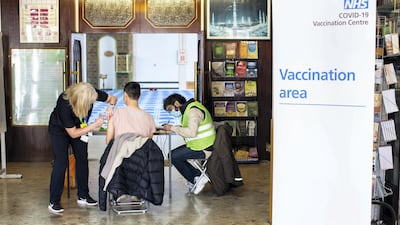 'I think people don't just go away with a jab in their arm, they go away with a really positive energy about what the NHS can do for them,' Dr Razak said. Mark Chilvers for The National