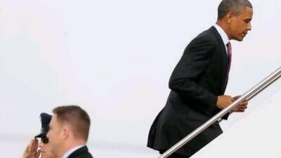 President Barack Obama prepares to board Air Force One before his travelling to Charlotte, North Carolina for the Democratic National Convention.