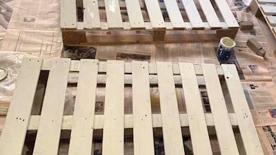 Step two - painting the pallets white. Photo by Samantha Hall