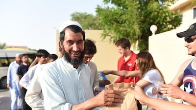 'We feed around 700 to 800 workers per day, that is 700 to 800 smiles per day,' says Fatima Masoud of the neighbourhood initiative. Alex Jeffries Photography Group