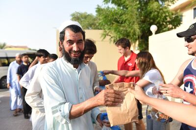 'We feed around 700 to 800 workers per day, that is 700 to 800 smiles per day,' says Fatima Masoud of the neighbourhood initiative. Alex Jeffries Photography Group