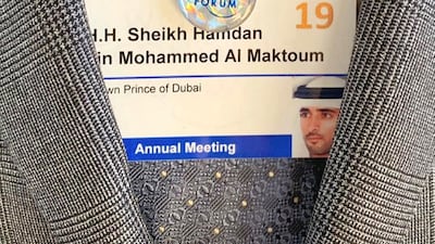 Sheikh Hamdan shares a picture of his identification card for the World Economic Forum.